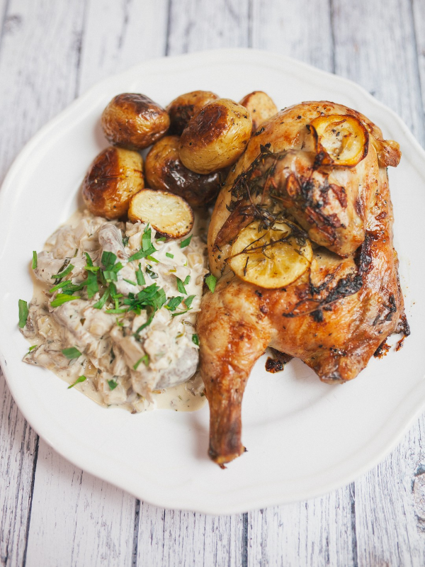 Half roast chicken with creamy tarragon & wild mushroom sauce